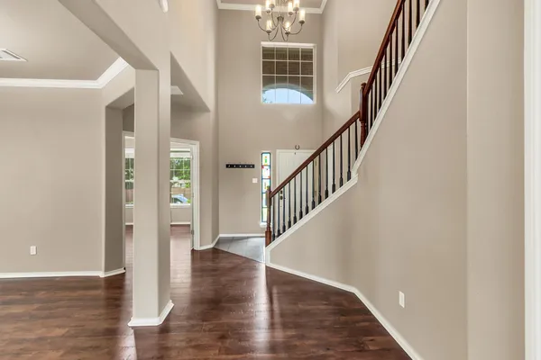 a view of entryway with wooden floor