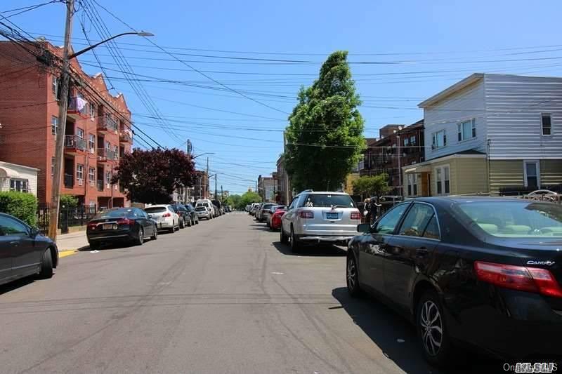 104-48 38th Avenue Queens, NY 11368 - Photo 8 of 9 a view of a cars park in front of a building