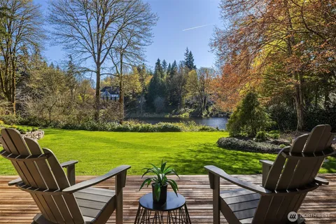 a view of a chairs and table in the garden