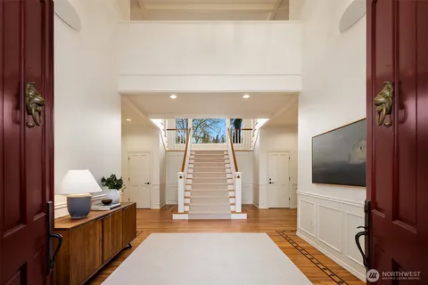 a view of a living room with bathroom
