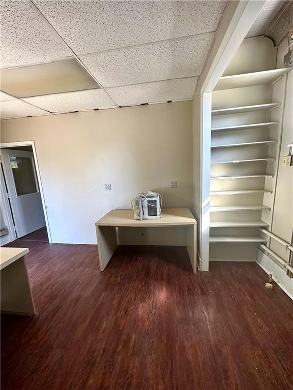 1480 Dormont Avenue Dormont, PA 15216 - Photo 2 of 4 a room with chair and wooden floor