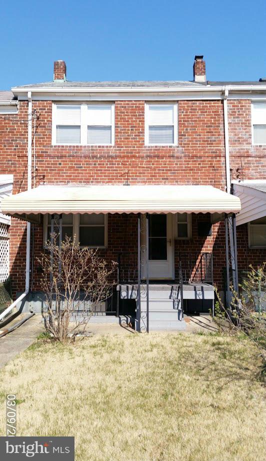 422 Scarsdale Road Baltimore, MD 21224 - Photo 2 of 7 a view of a dinning table and chairs in patio