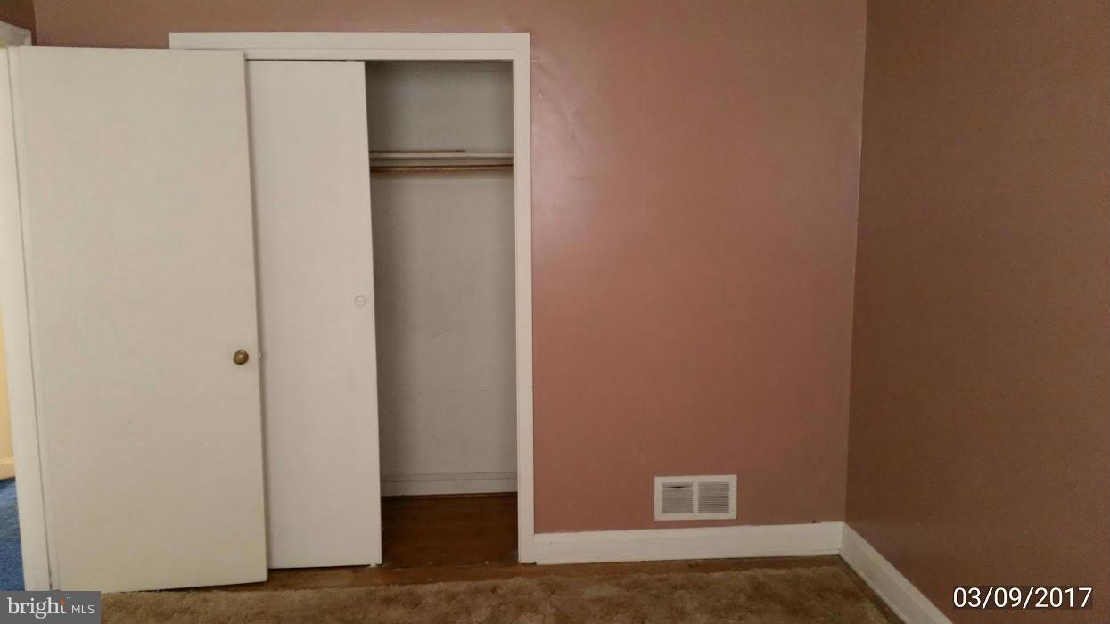 422 Scarsdale Road Baltimore, MD 21224 - Photo 5 of 7 a view of an empty room