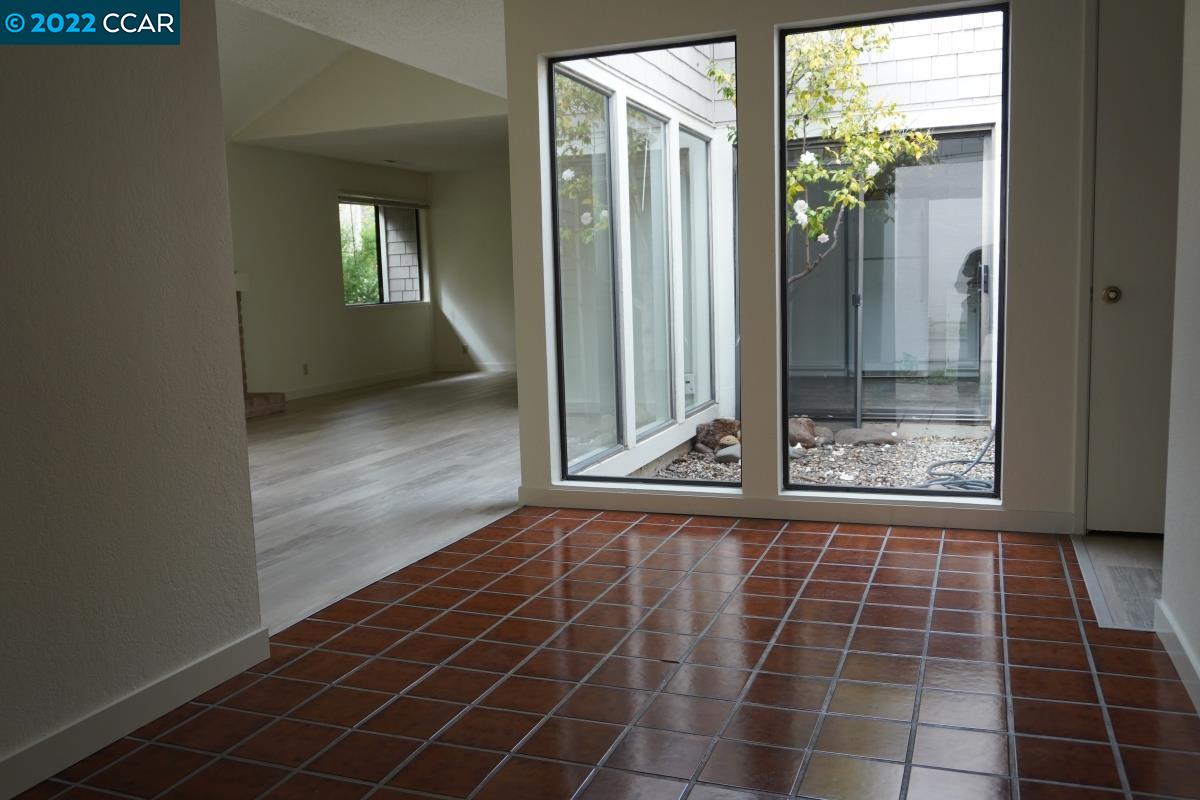 541 Adirondack Way Walnut Creek, CA 94598 - Photo 2 of 16 a view of a bathroom with a glass door and a window