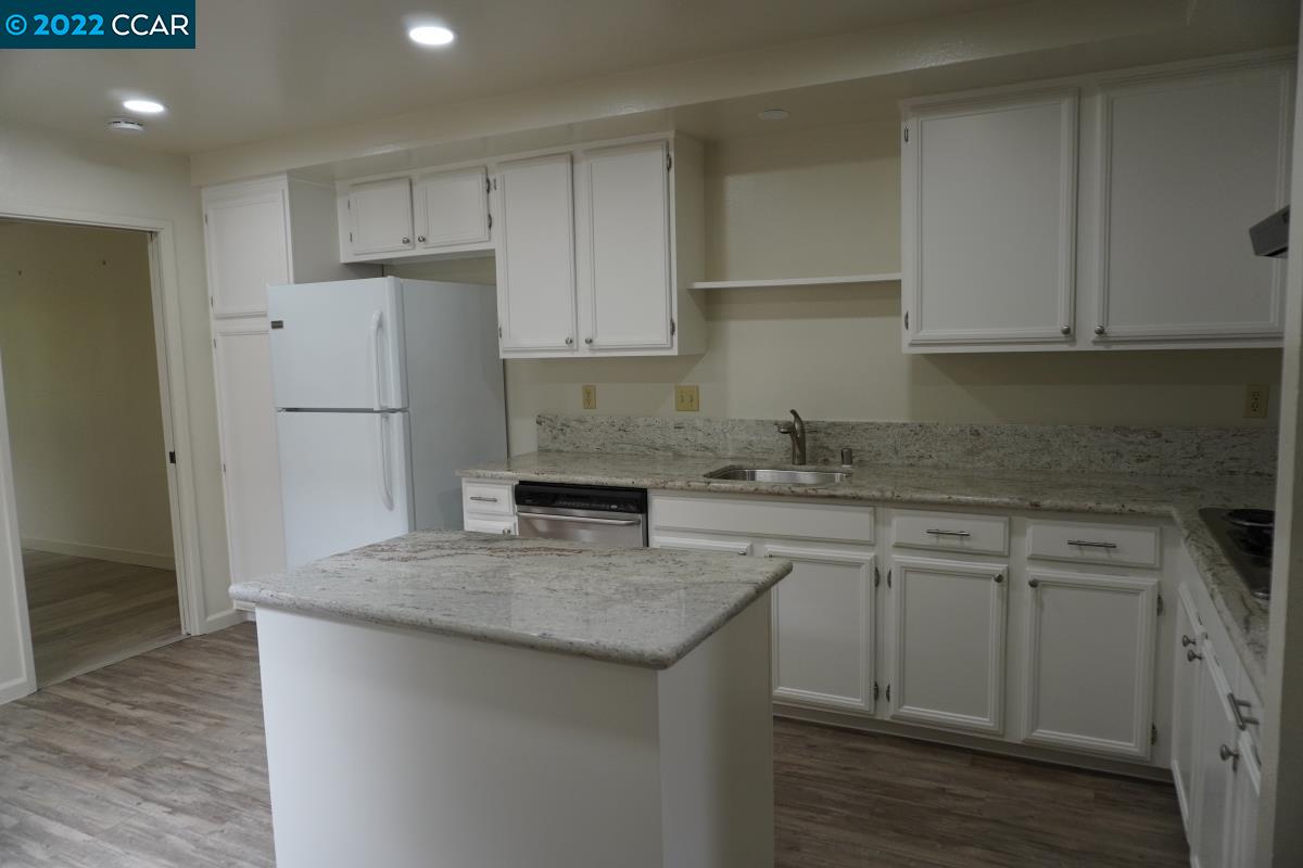 541 Adirondack Way Walnut Creek, CA 94598 - Photo 10 of 16 a kitchen with stainless steel appliances granite countertop a sink stove and refrigerator