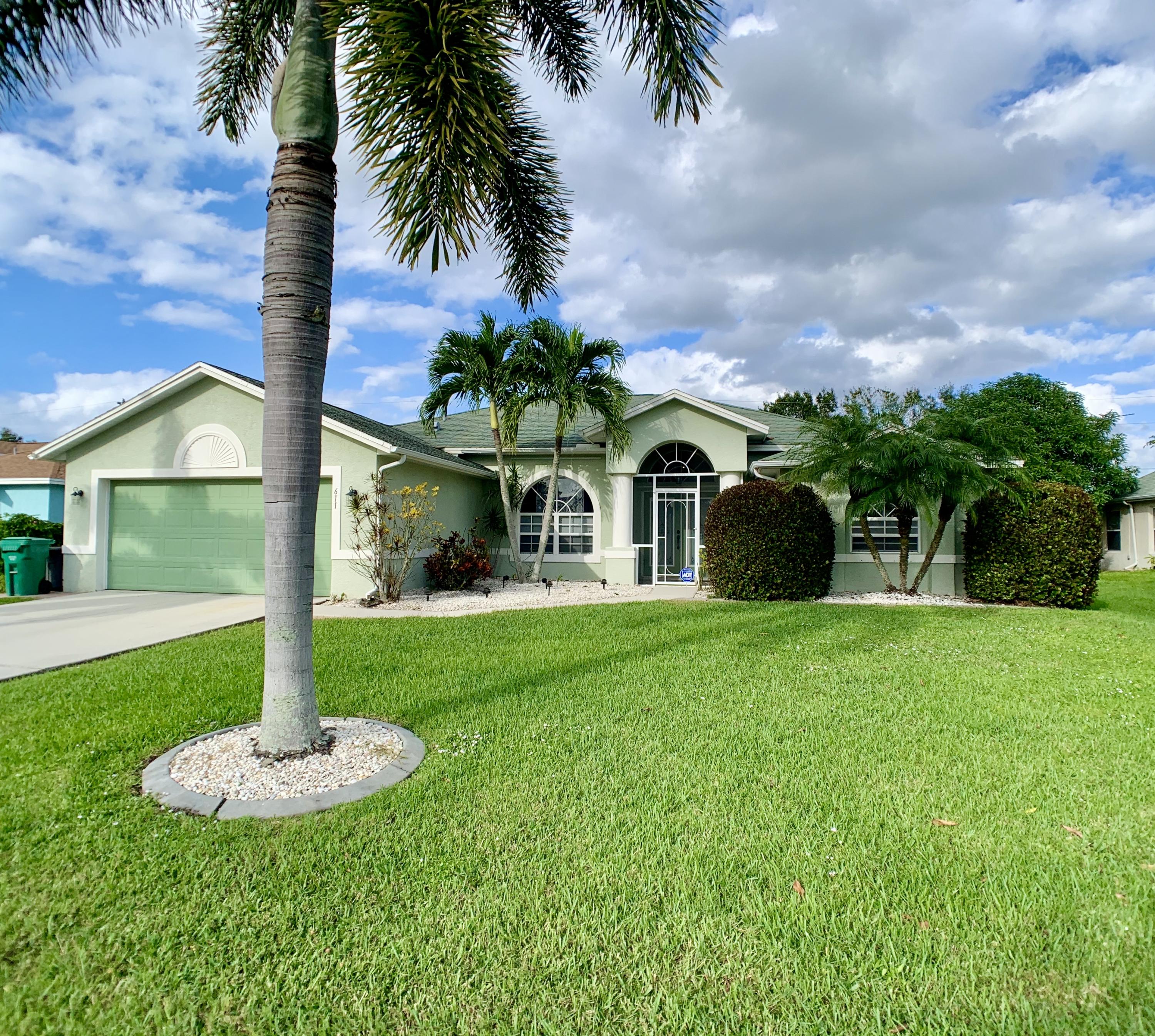 611 Southwest Aster Road Port St. Lucie, FL 34953 - Photo 1 of 40 Front