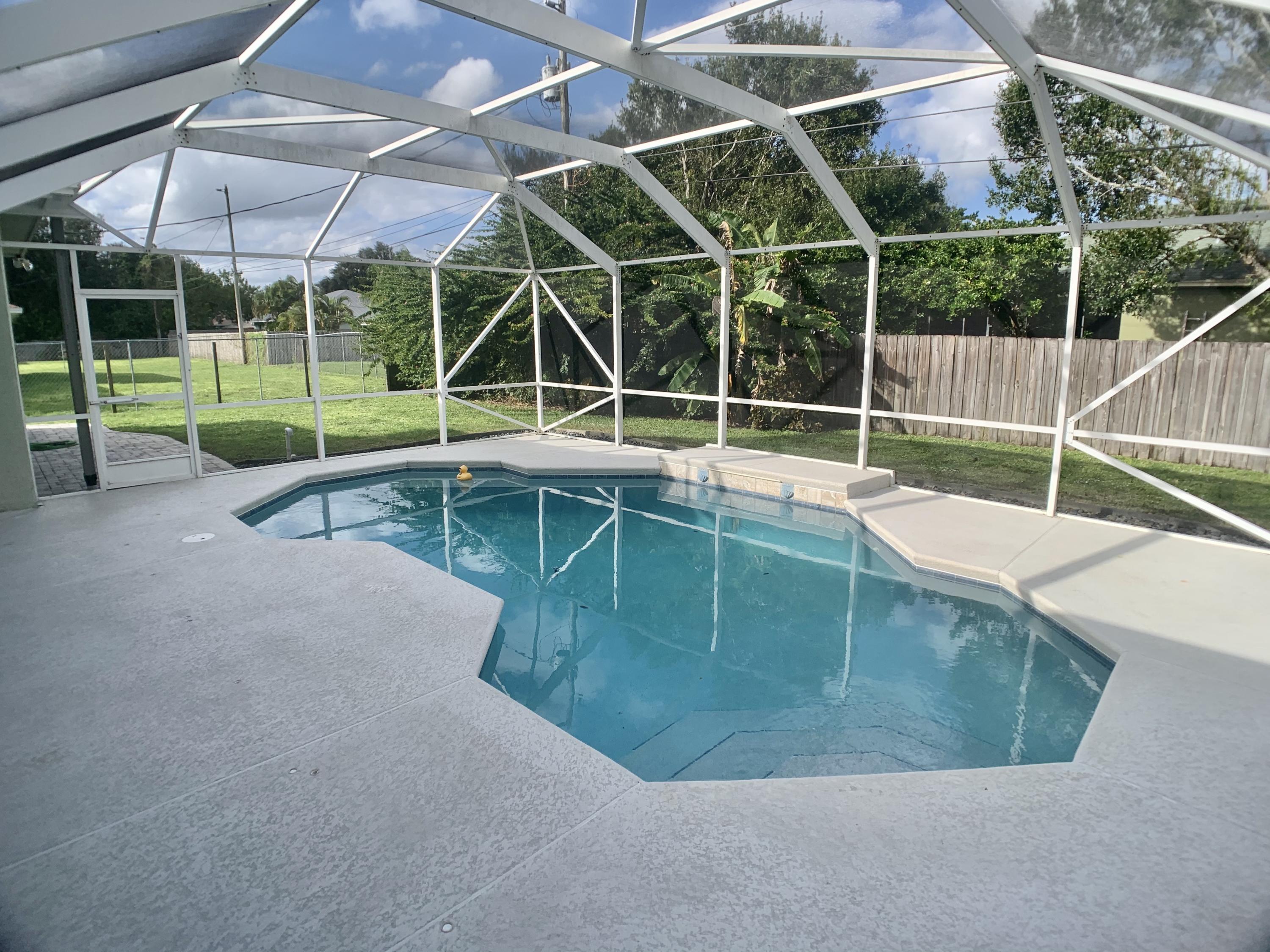 611 Southwest Aster Road Port St. Lucie, FL 34953 - Photo 3 of 40 5502431C-FF58-4795-8A28-53093A6153FC_1_2