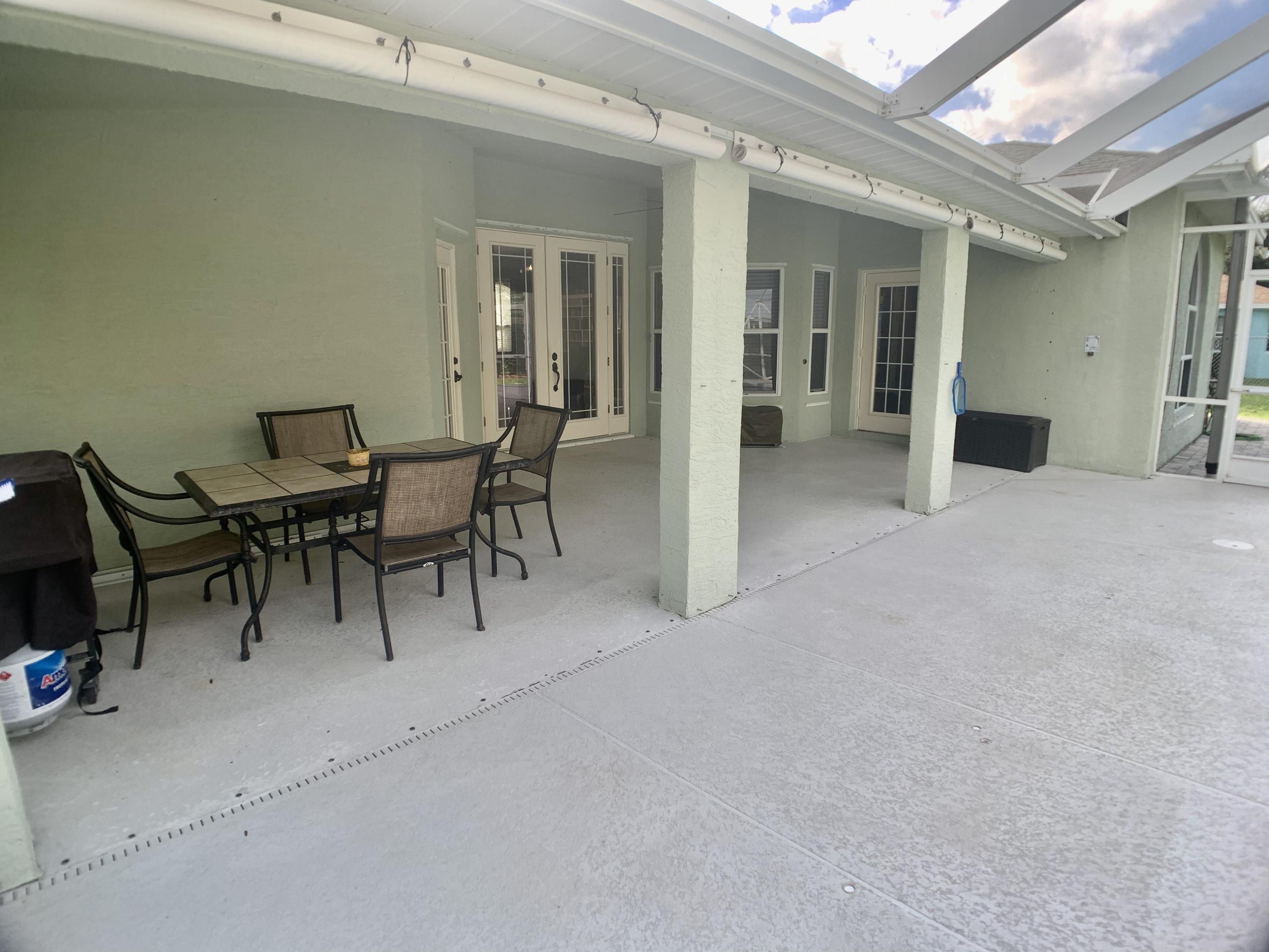 611 Southwest Aster Road Port St. Lucie, FL 34953 - Photo 33 of 40 191F7C82-30D1-4E6C-AF4C-001FC692D1CE_1_2