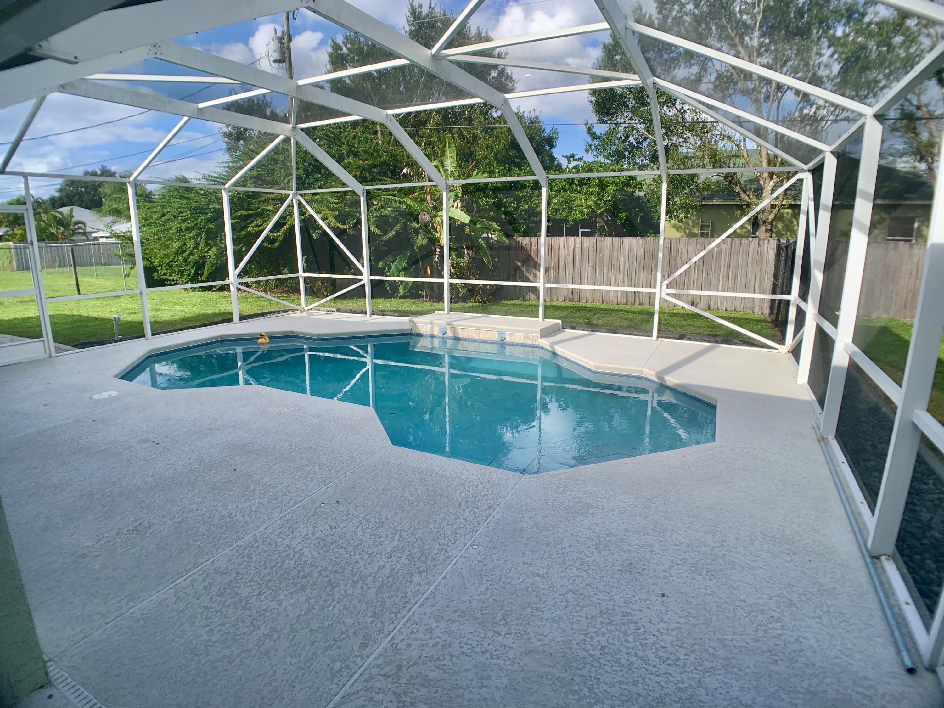 611 Southwest Aster Road Port St. Lucie, FL 34953 - Photo 36 of 40 5888011D-8B7D-4E47-8C2F-D40D42D643FB_1_2