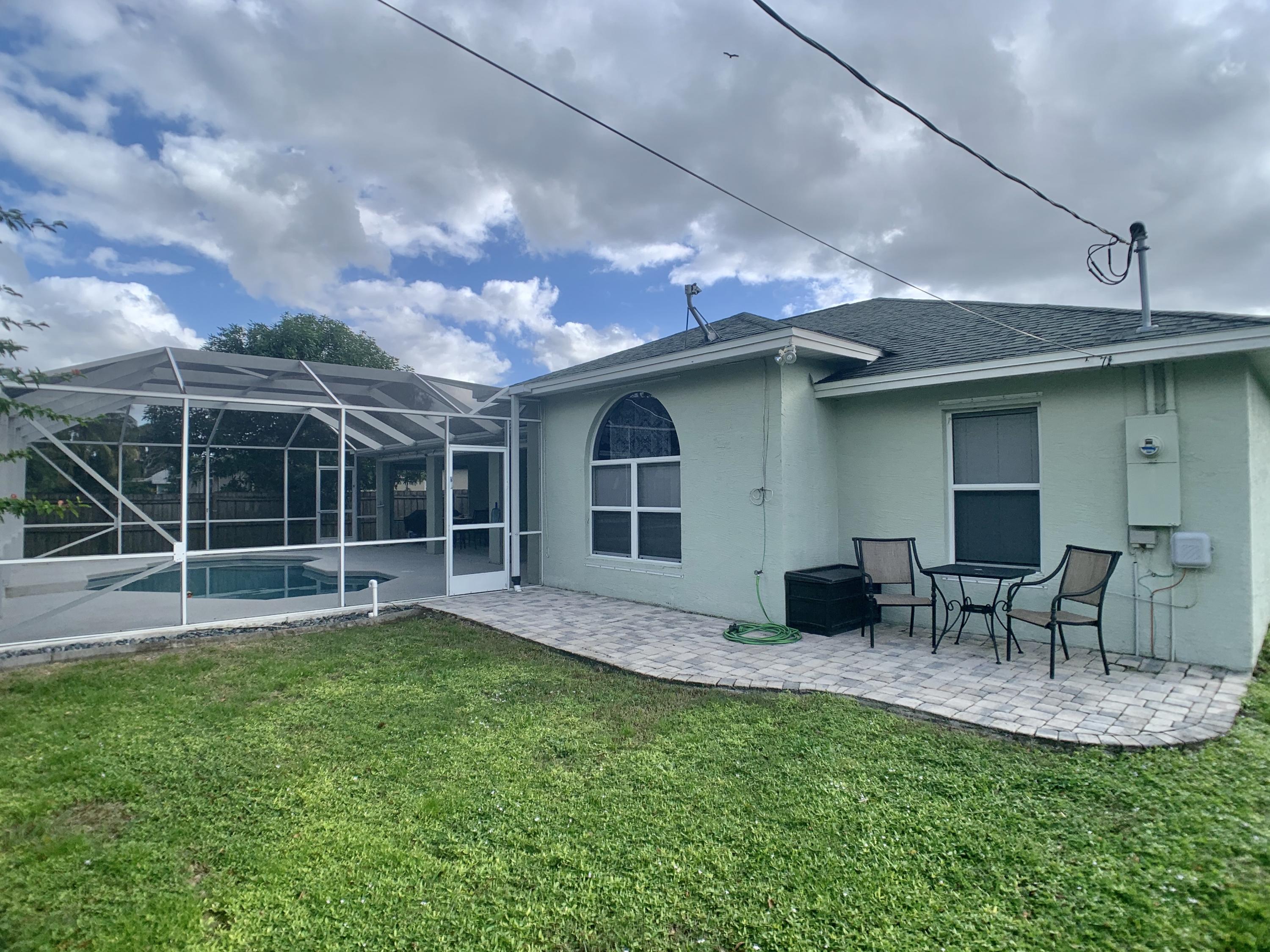 611 Southwest Aster Road Port St. Lucie, FL 34953 - Photo 38 of 40 044EBFEA-D28B-4C9A-99DB-4FB809EBF8FE_1_2