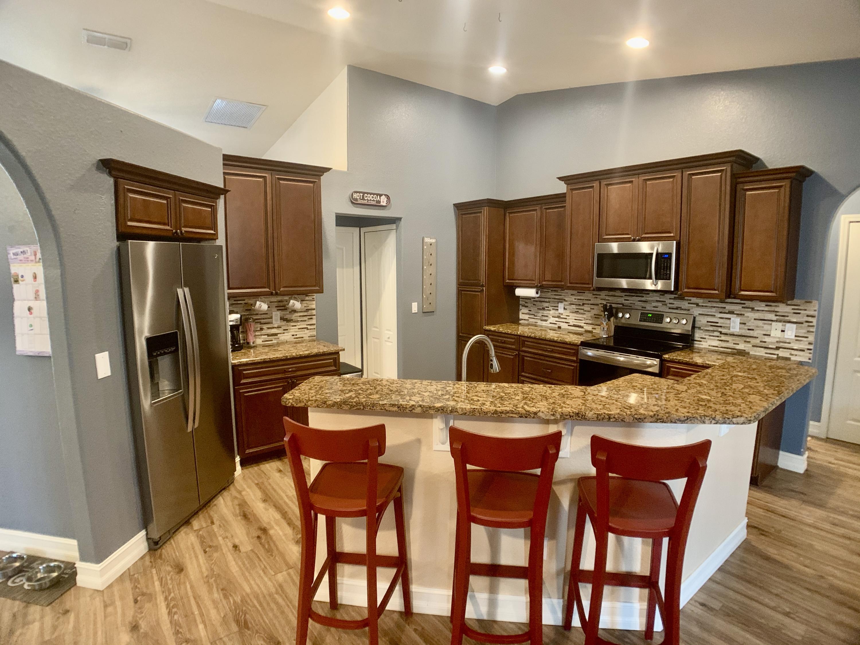 611 Southwest Aster Road Port St. Lucie, FL 34953 - Photo 4 of 40 2D032D06-2329-46C8-9D13-CCA856AA8023_1_2