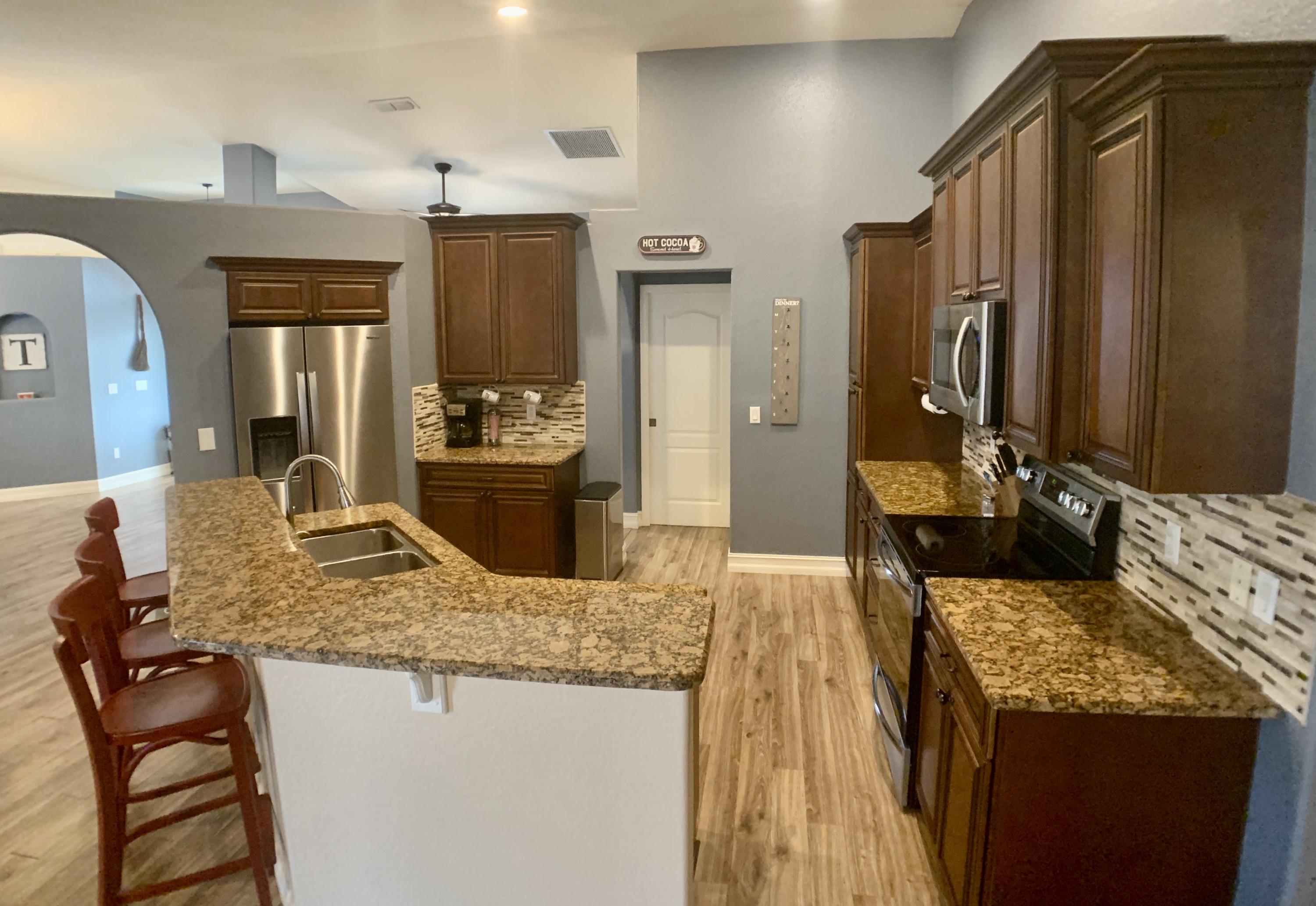 611 Southwest Aster Road Port St. Lucie, FL 34953 - Photo 7 of 40 F51AD10B-A20D-4D09-8843-5C558A0A5C1F_1_2
