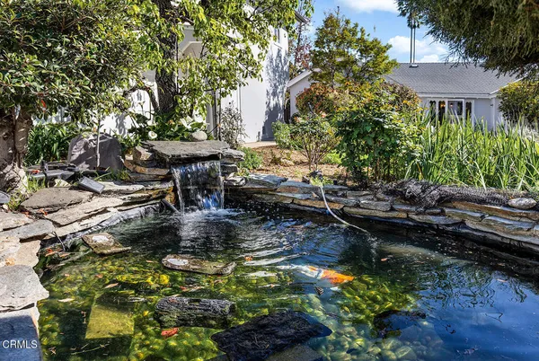 a view of swimming pool with a patio