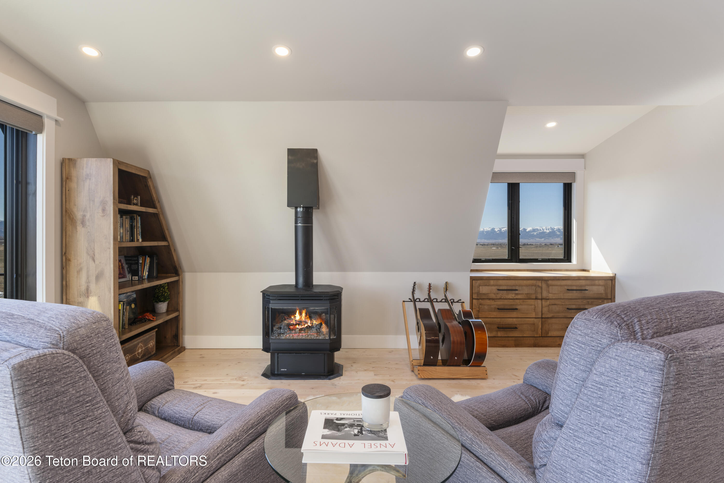 4599 Surprise Valley Road Tetonia, ID 83452 - Photo 20 of 63 8.1 Master bedroom fireplace and seating
