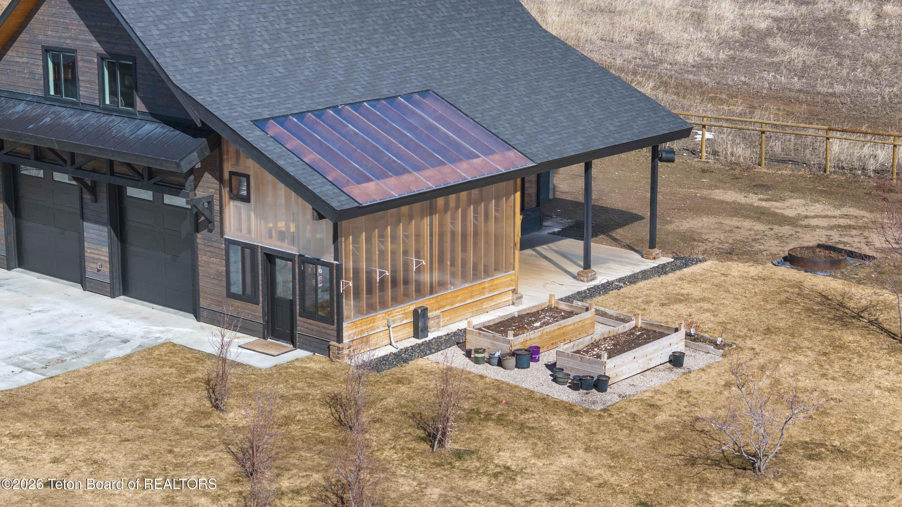 4599 Surprise Valley Road Tetonia, ID 83452 - Photo 51 of 63 Raised beds and greenhouse