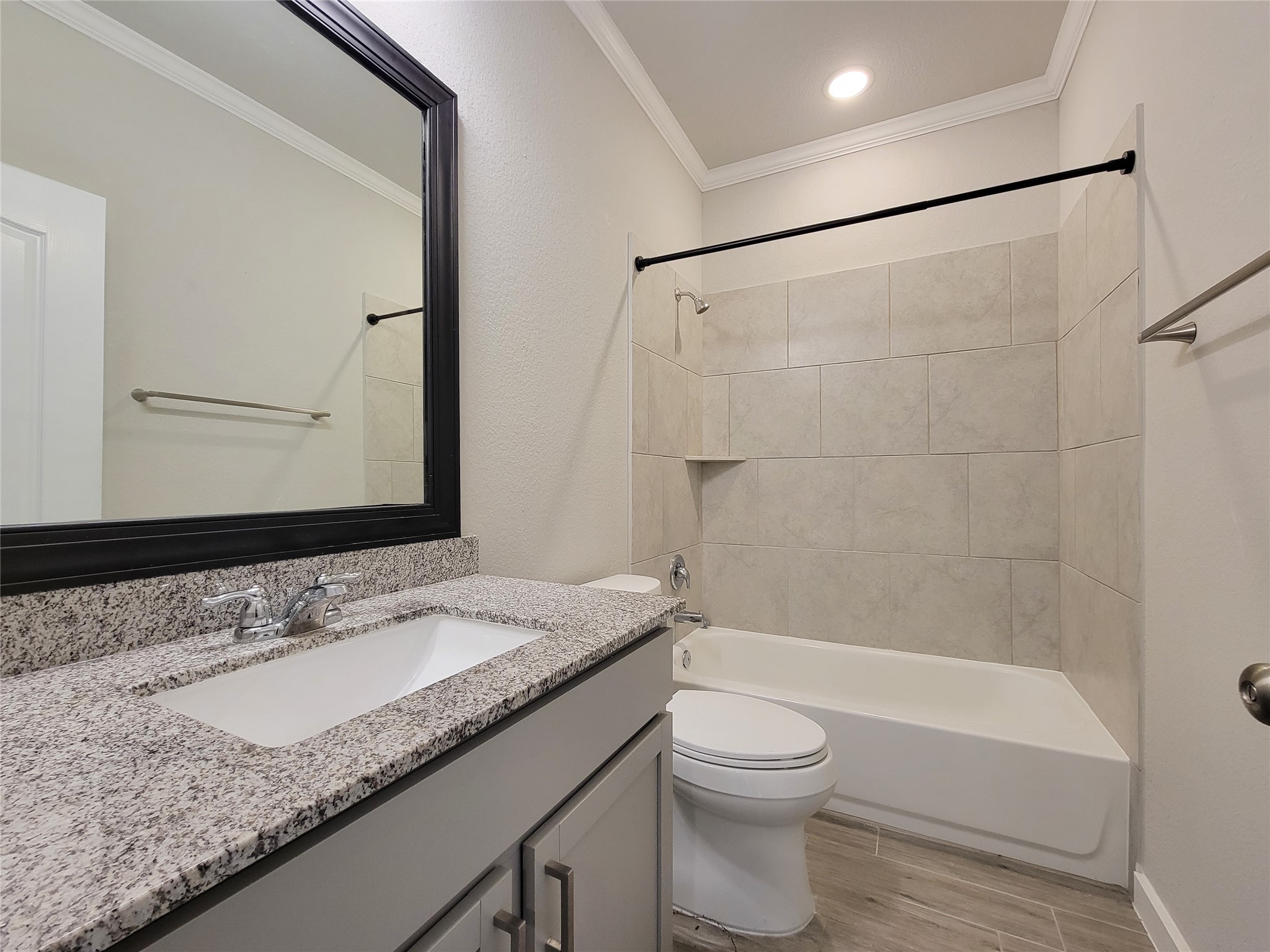 31402 Conover Drive Fulshear, TX 77441 - Photo 10 of 20 a bathroom with a granite countertop sink toilet and shower