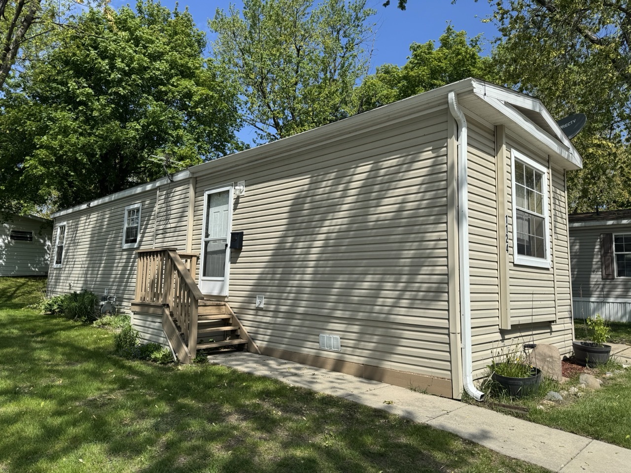 1124 Bayside Road Elgin, IL 60123 - Photo 12 of 26 a view of backyard with barbeque grill and wooden fence