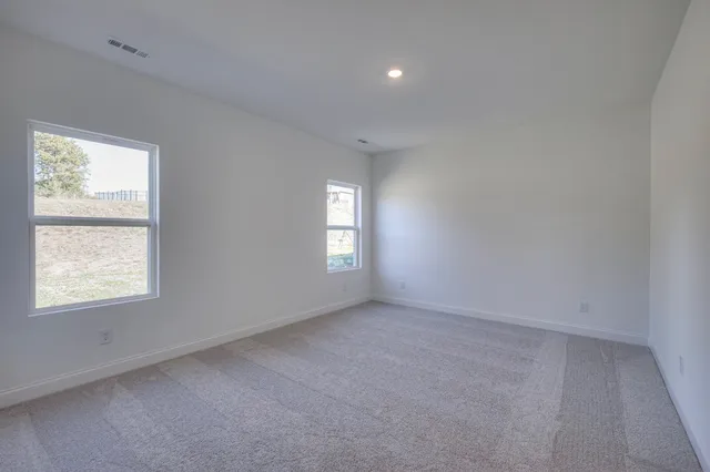 an empty room with an entryway