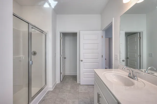 a view of a hallway with an entryway