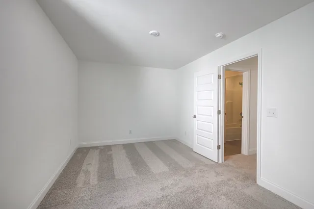 a bathroom with a bathtub and a sink