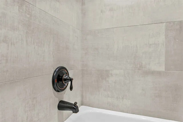 a bathroom with a shower curtain