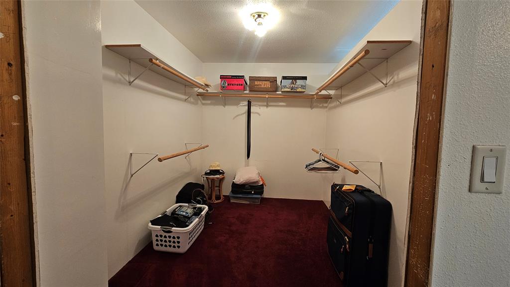 8736 Johns Road Alvarado, TX 76009 - Photo 13 of 32 a view of a room with gym equipment