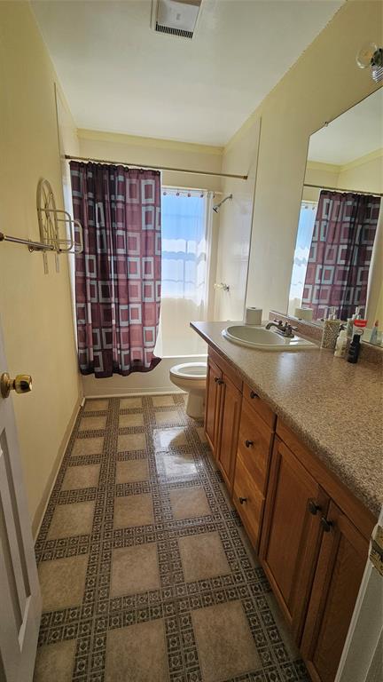 8736 Johns Road Alvarado, TX 76009 - Photo 20 of 32 a kitchen with a sink and cabinets