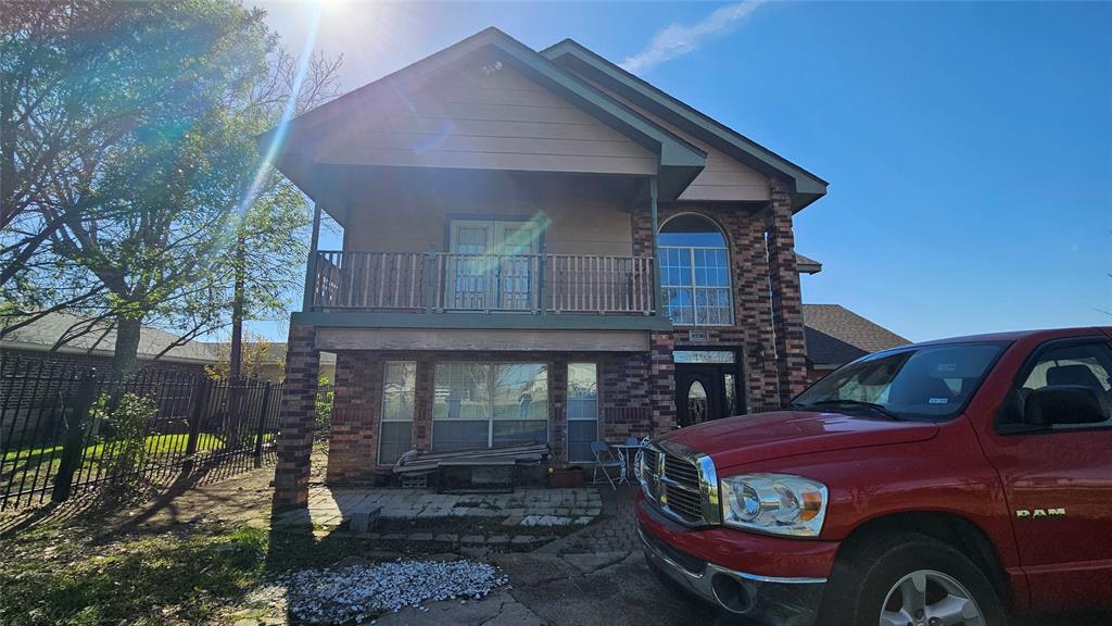 8736 Johns Road Alvarado, TX 76009 - Photo 2 of 32 a front view of a house with a yard