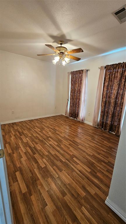8736 Johns Road Alvarado, TX 76009 - Photo 23 of 32 a view of empty room with wooden floor