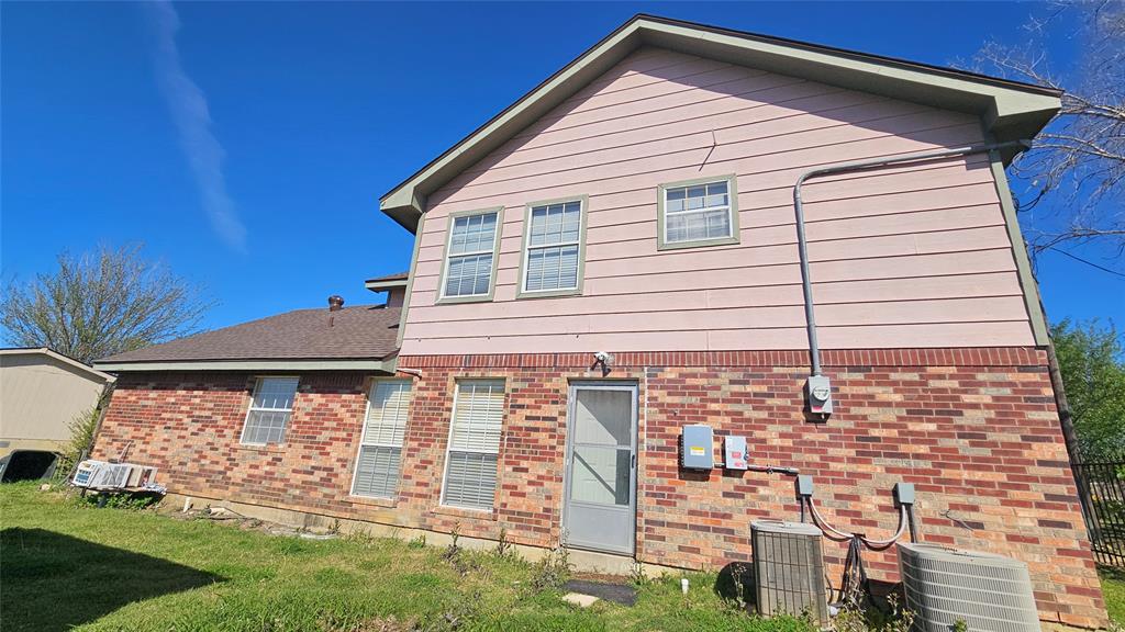 8736 Johns Road Alvarado, TX 76009 - Photo 24 of 32 a front view of a house with a yard