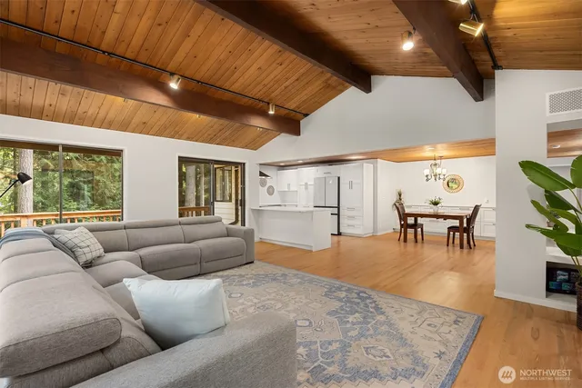 a living room with furniture and a table