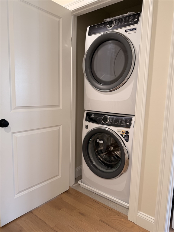 9 Acton Road, Unit 8 Chelmsford, MA 01824 - Photo 6 of 12 a utility room with dryer and washer