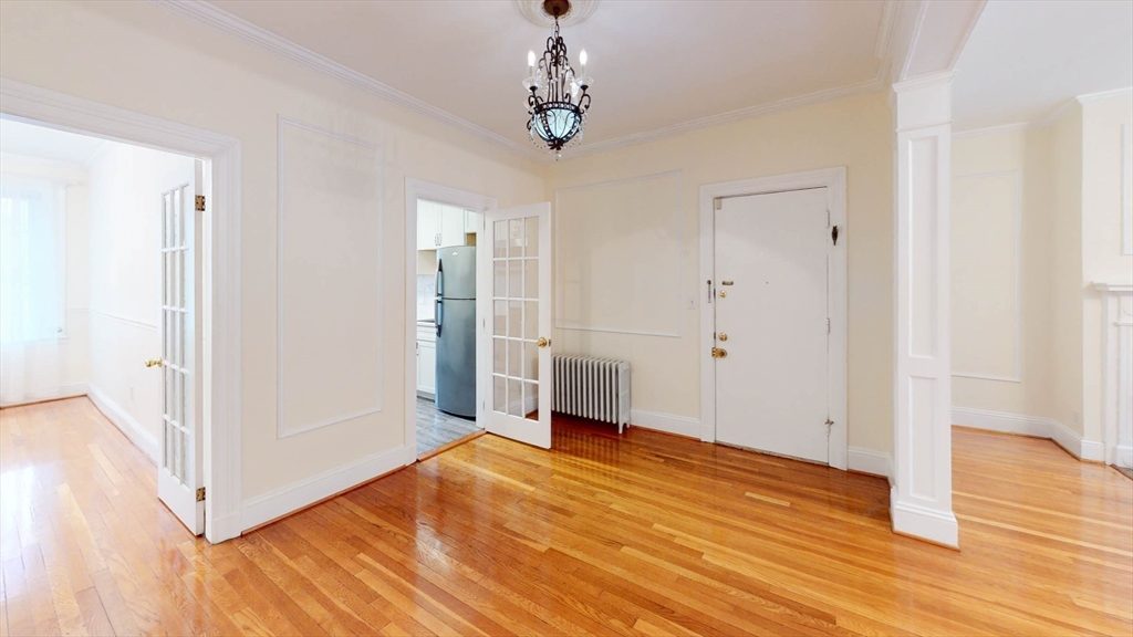 311 Tappan Street, Unit 3 Brookline, MA 02445 - Photo 10 of 35 a view of empty room with wooden floor