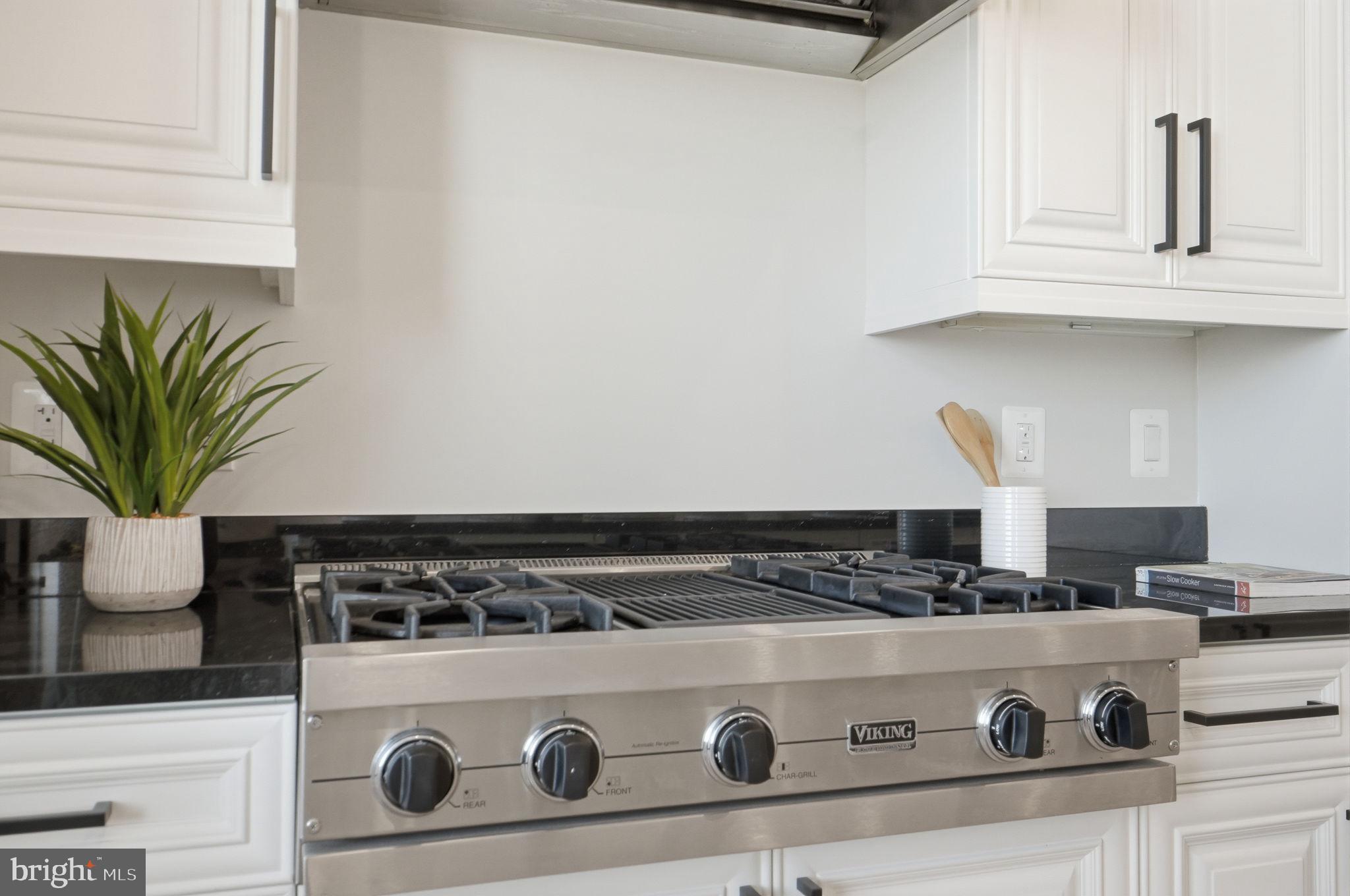 11990 Market Street, Unit 2103 Reston, VA 20190 - Photo 16 of 78 Sleek kitchen with modern appliances.