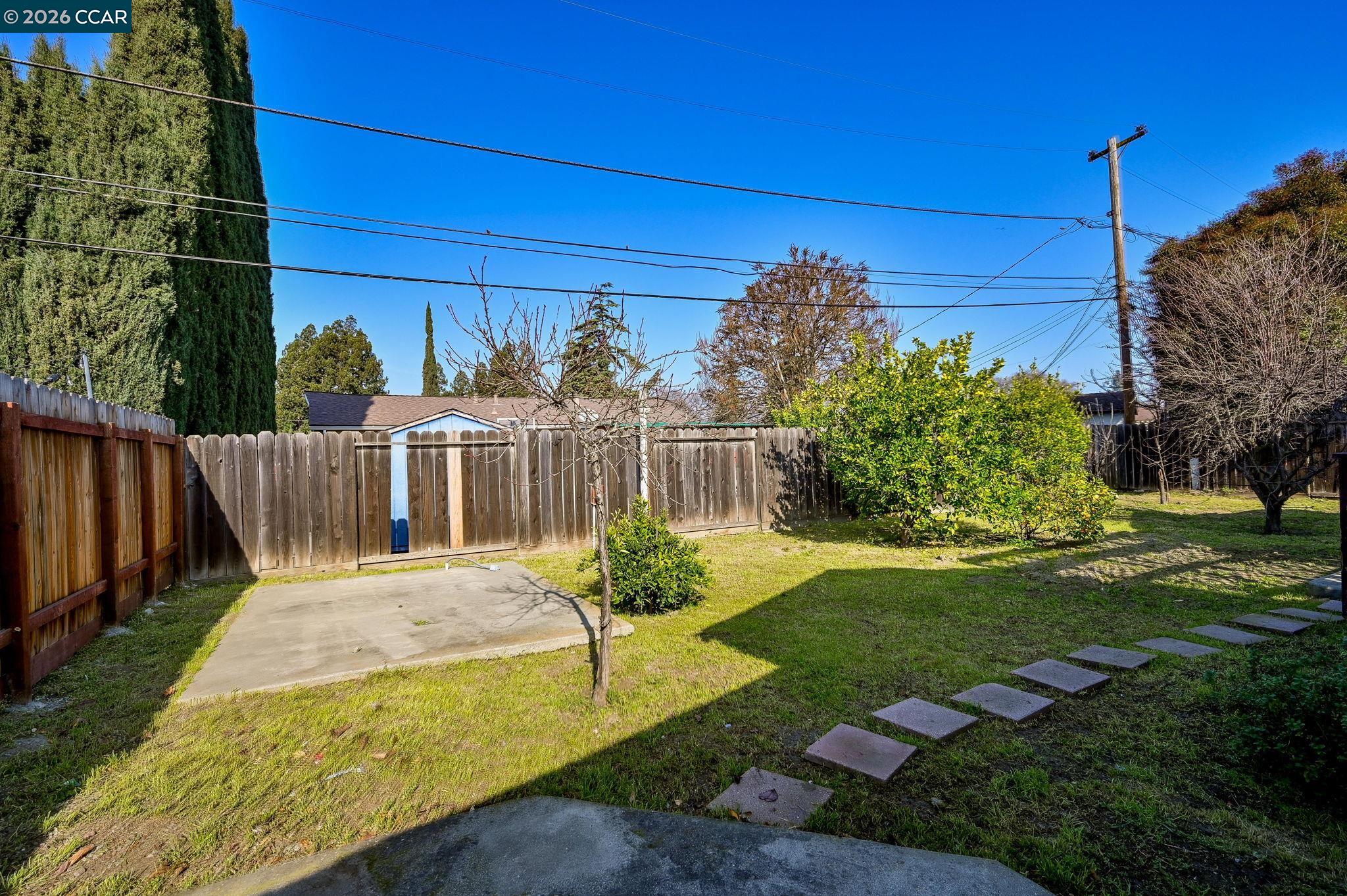 1921 Gilly Lane Concord, CA 94518 - Photo 25 of 29 a view of a backyard with wooden fence