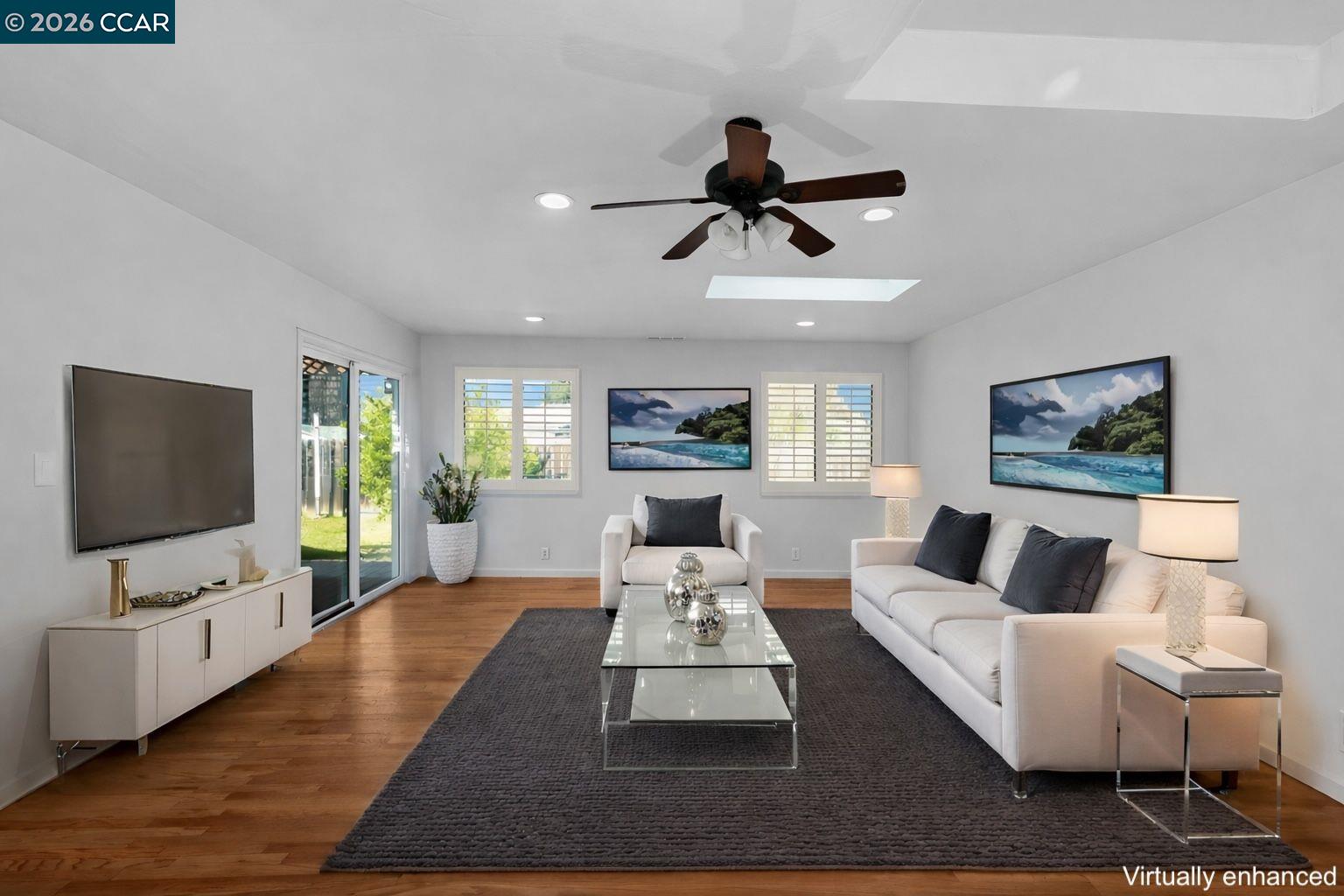 1921 Gilly Lane Concord, CA 94518 - Photo 8 of 29 a living room with furniture and a flat screen tv