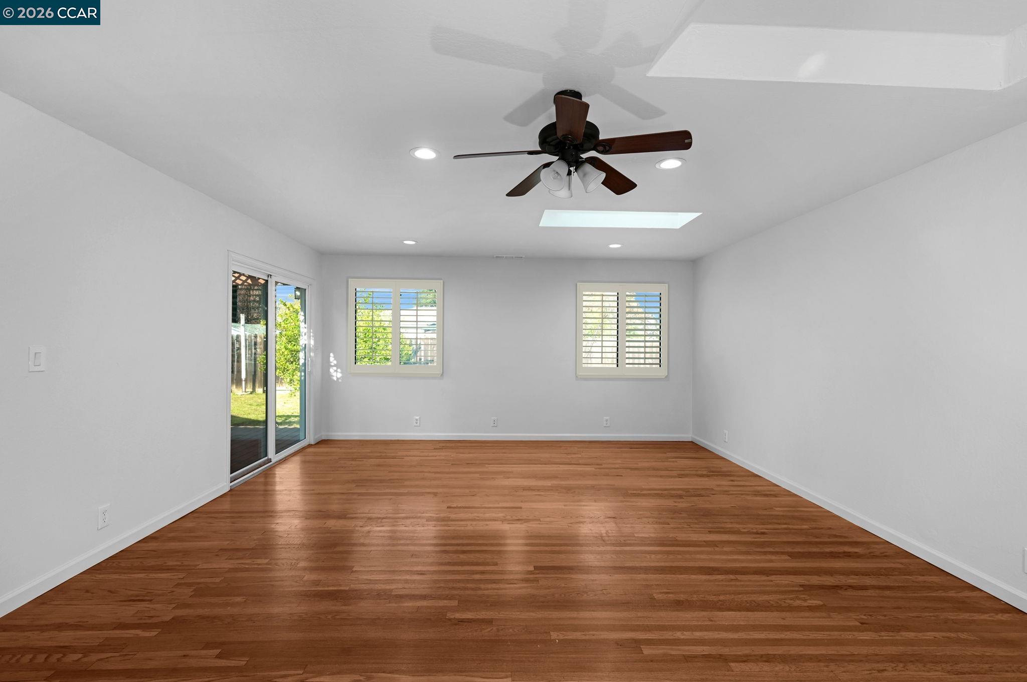 1921 Gilly Lane Concord, CA 94518 - Photo 9 of 29 a view of empty room with wooden floor and window