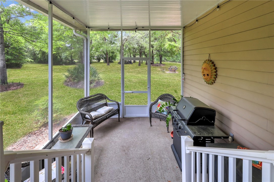1186 Coopers Point Drive Northeast Townsend, GA 31331 - Photo 40 of 85 screen room was added on to recently and offers a great space to entertaining