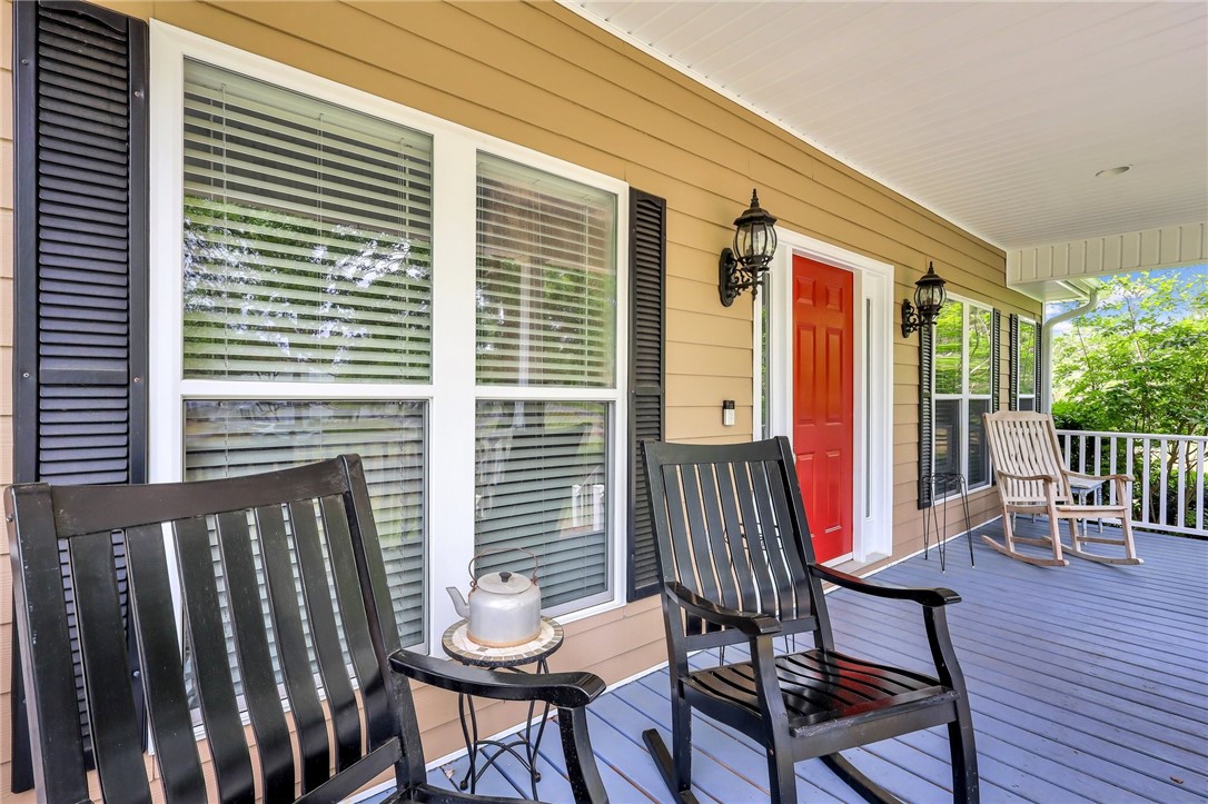 1186 Coopers Point Drive Northeast Townsend, GA 31331 - Photo 7 of 85 enjoy the mornings on your rocking chair front porch