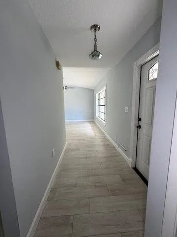 a view of an empty room and window