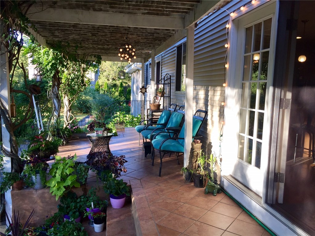 76 Hines Road Cumberland, RI 02864 - Photo 3 of 40 Pergola Covered Terrace Overlooks Private Oasis~