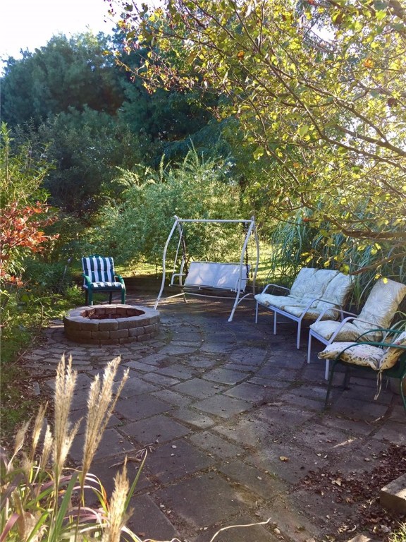 76 Hines Road Cumberland, RI 02864 - Photo 33 of 40 Private Fire Pit & Patio Area