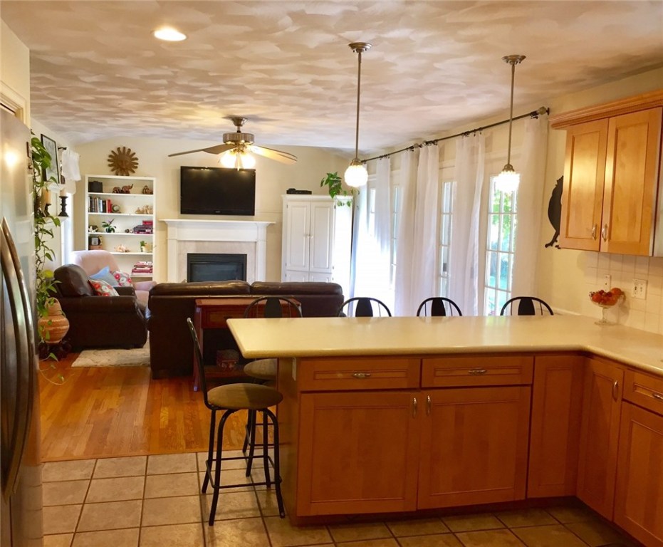 76 Hines Road Cumberland, RI 02864 - Photo 5 of 40 Kitchen Open to Living Room w/Gas Fireplace & Double French Doors~