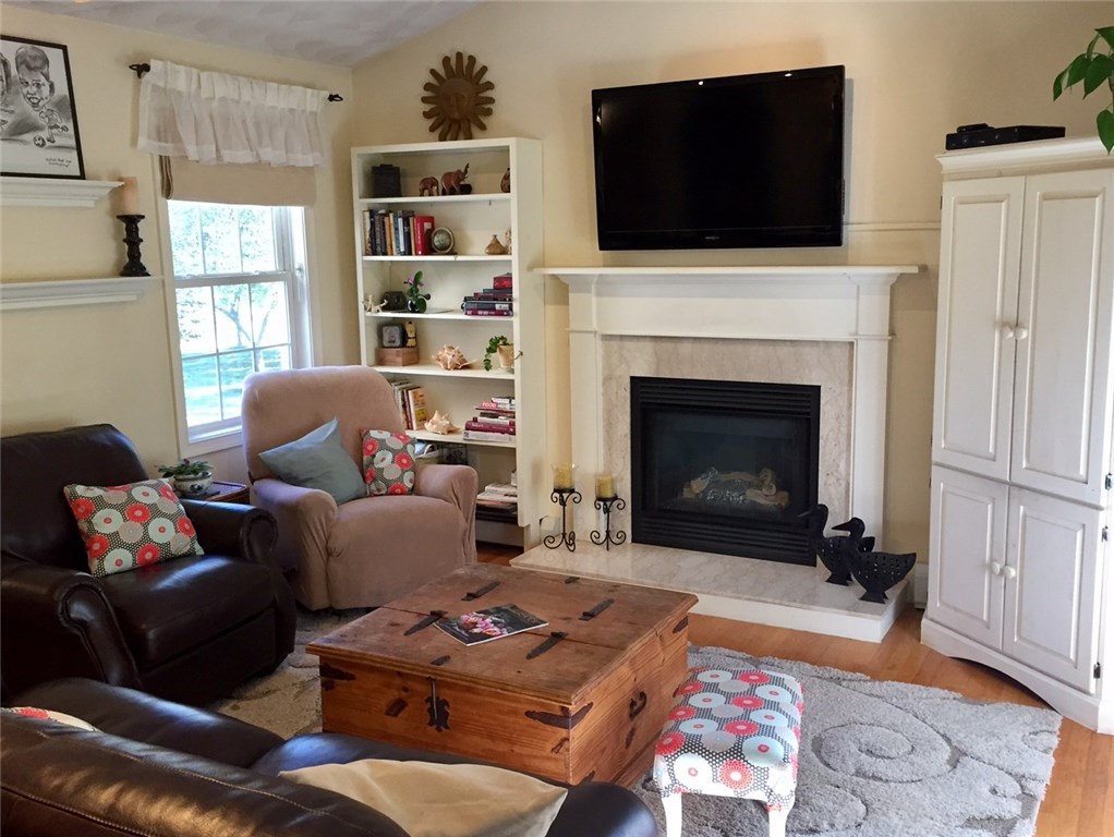 76 Hines Road Cumberland, RI 02864 - Photo 7 of 40 Living Room with Vaulted Ceiling, Gas Fireplace~
