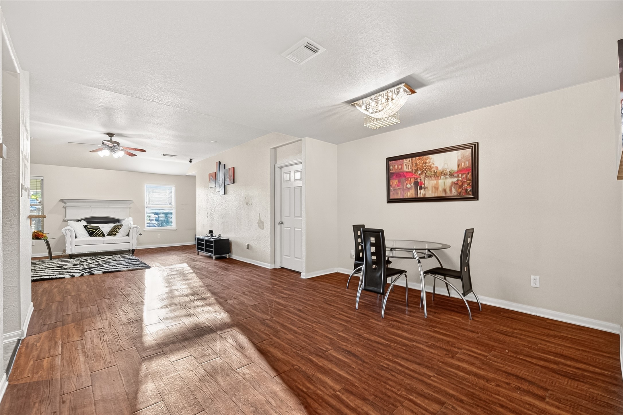 16715 Mackenzie Mesa Drive Spring, TX 77379 - Photo 6 of 50 a view of a dining room with furniture and wooden floor