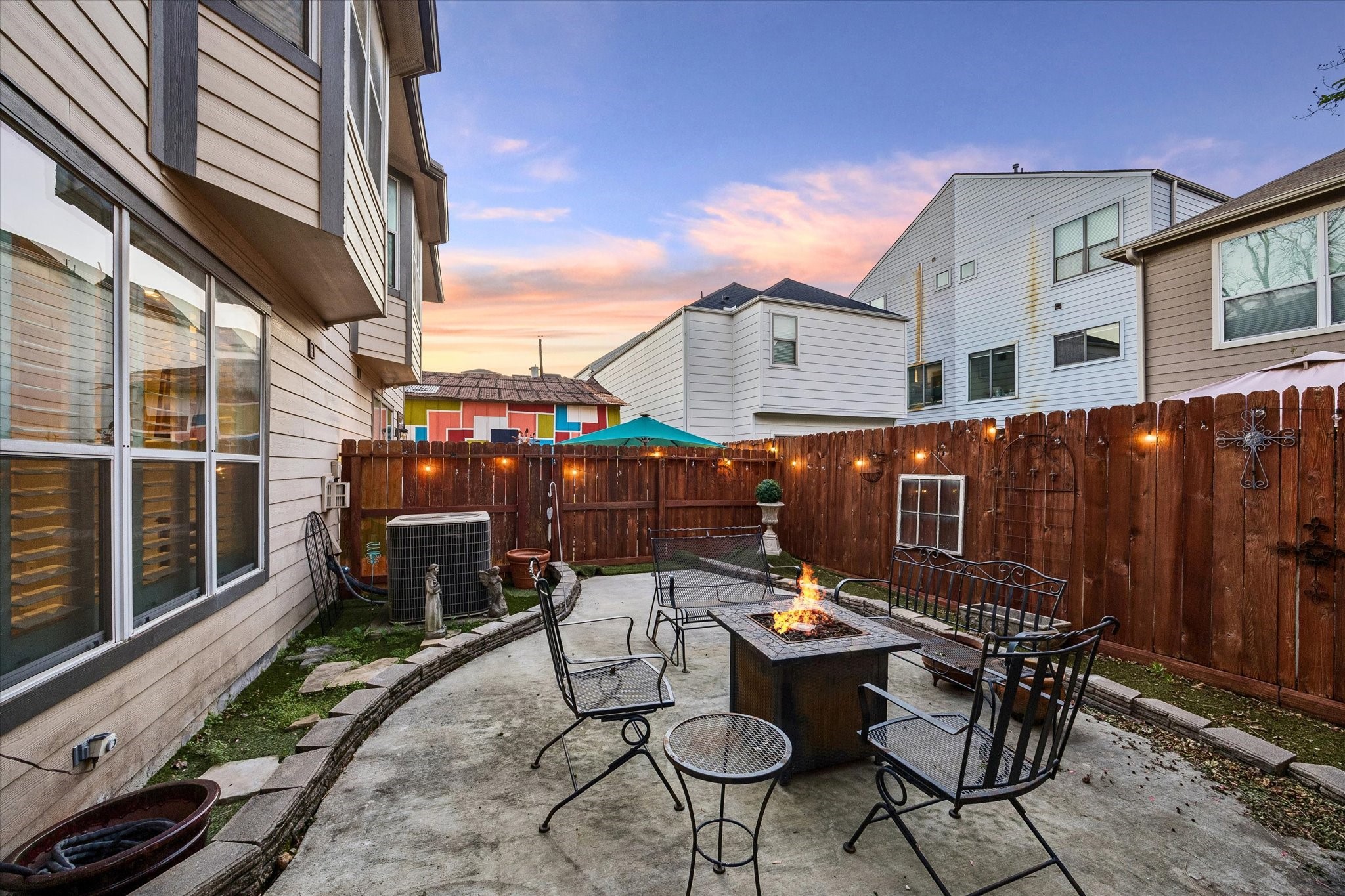 5242 Eigel Street Houston, TX 77007 - Photo 27 of 29 Great backyard with a patio and space for entertaining.