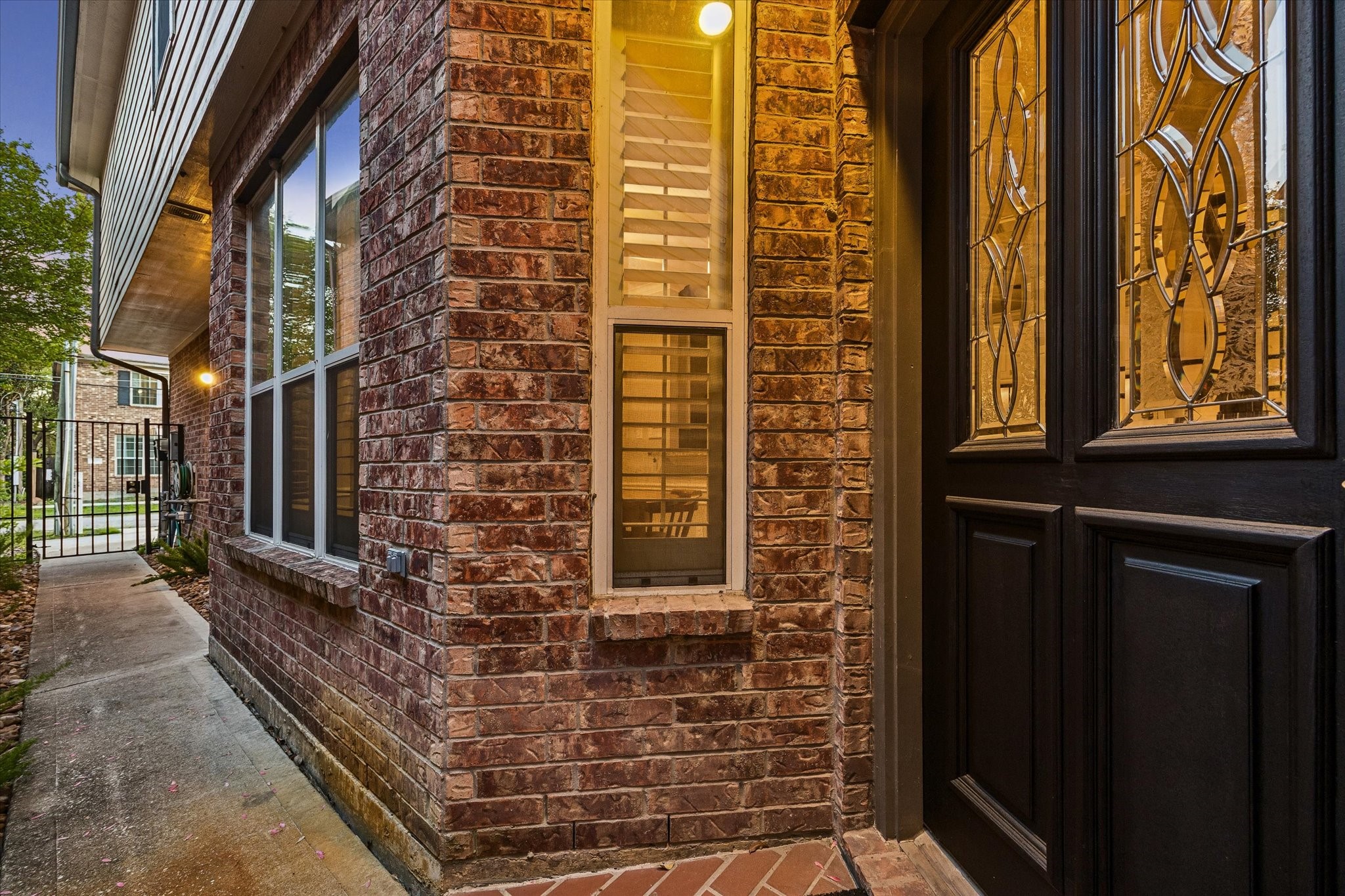 5242 Eigel Street Houston, TX 77007 - Photo 3 of 29 A view of the private walk-up gate providing extra safety.