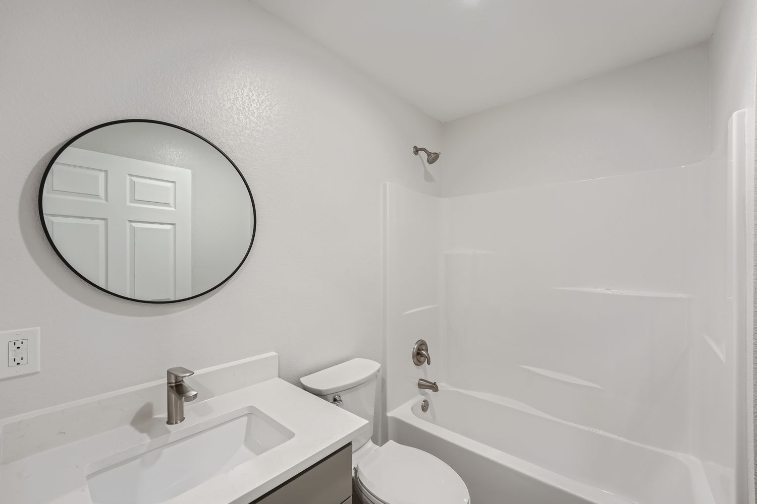 111 Fisher Street, Unit A & B Elgin, TX 78621 - Photo 8 of 13 a bathroom with a sink toilet and a mirror