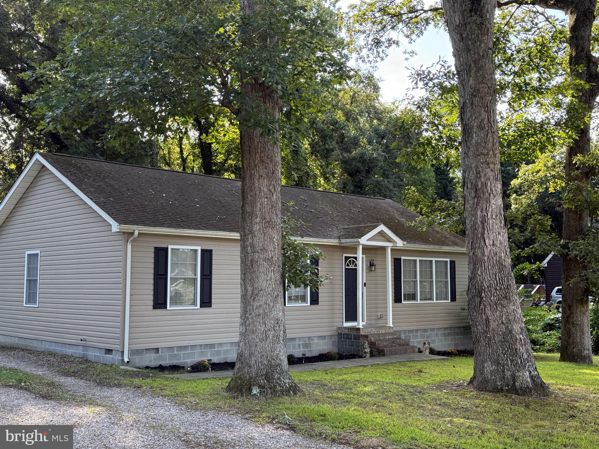 6209 Rockawalkin Road Salisbury, MD 21801 - Photo 1 of 37 a front view of house with yard and green space