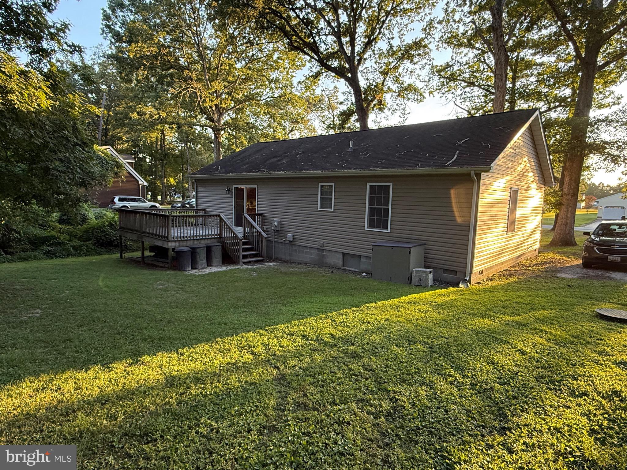 6209 Rockawalkin Road Salisbury, MD 21801 - Photo 13 of 37 a front view of a house with garden